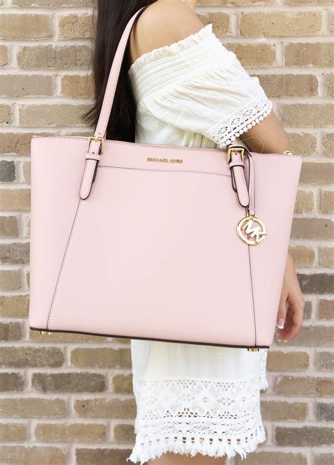 pink pastel michael kors tote bag|Michael Kors pink suitcase.